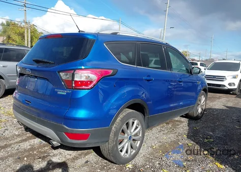 2017 Ford Escape Titanium z USA, uszkodzony, nr VIN 1FMCU0JD9HUF05442